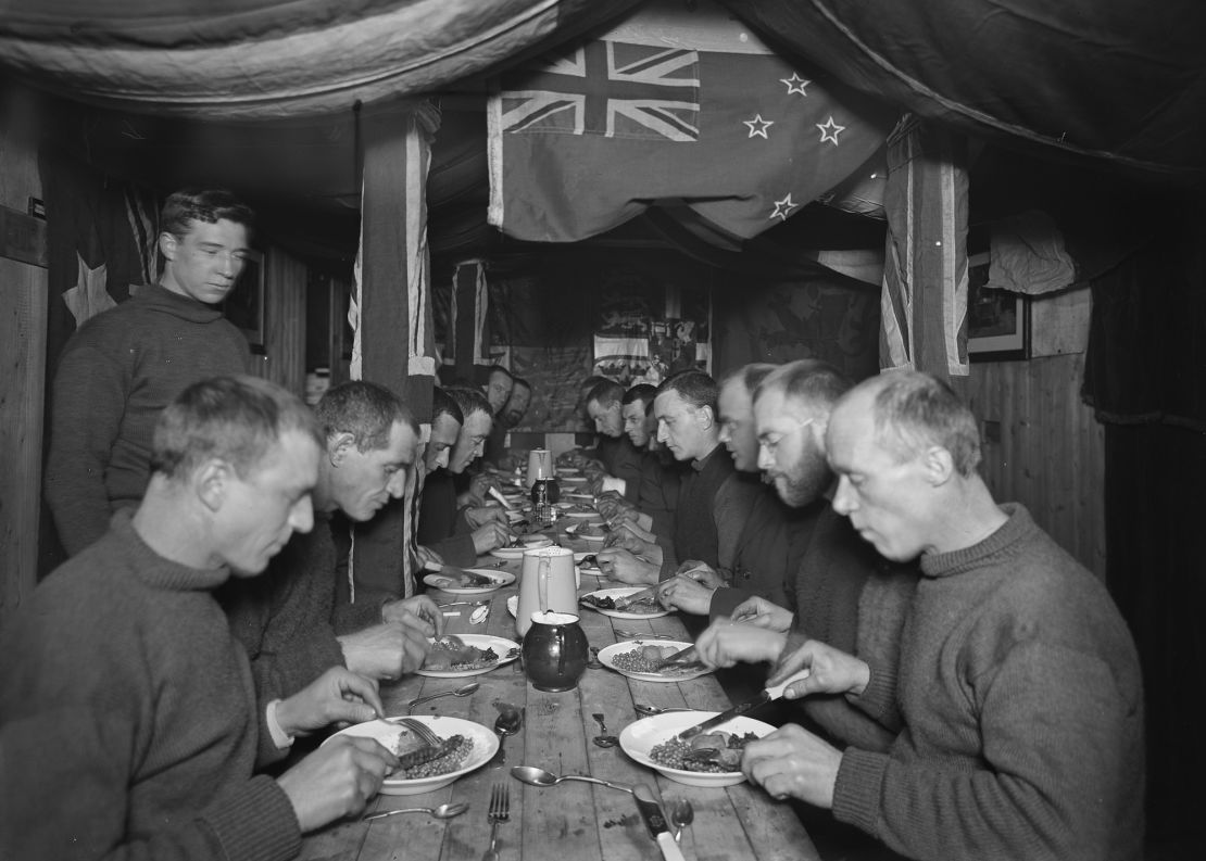 The crew of the Endurance eating a meal on board, four months before they were forced to abandon ship.